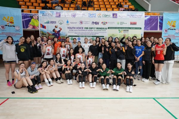 Teams gathered at the close of the signing session.